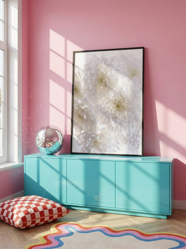 Modern wall art print standing on a sideboard in a colourful eclectic nursery