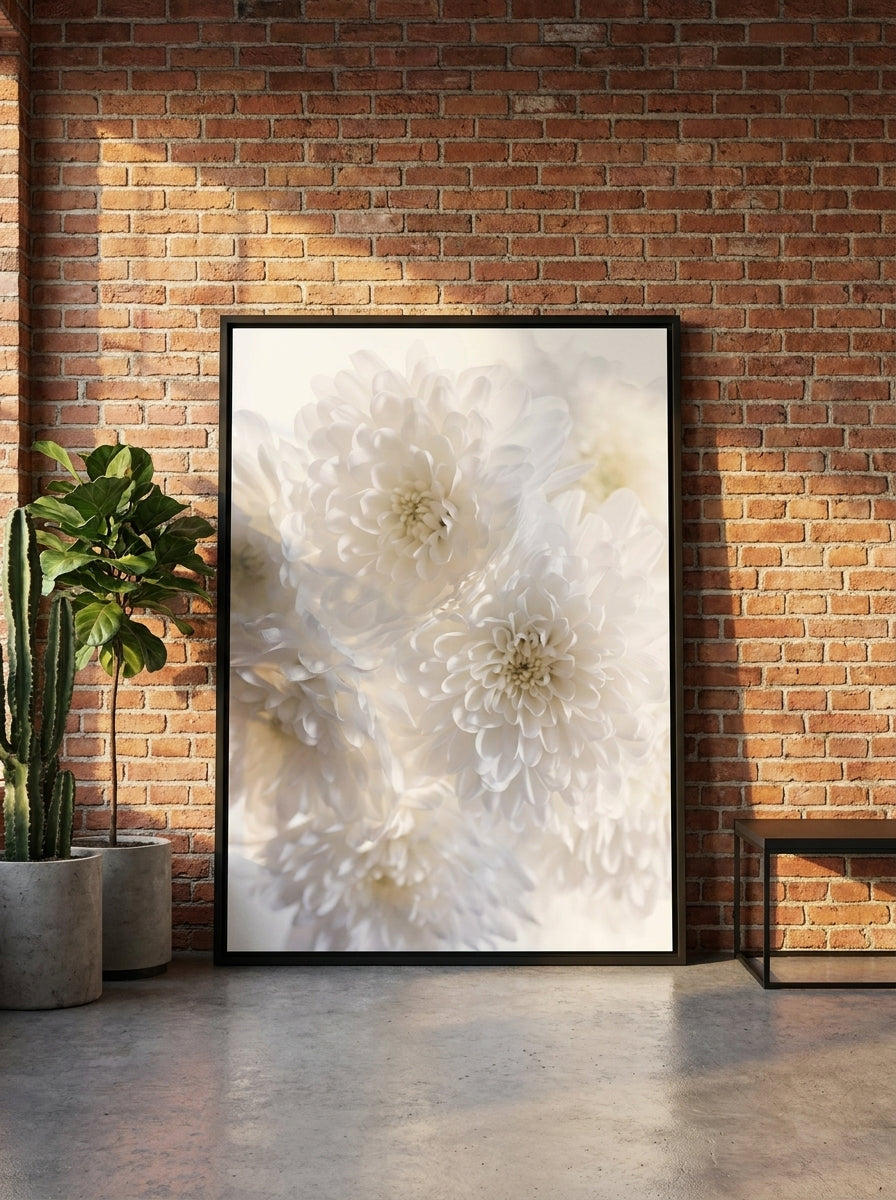 Oversized statement canvas wall art with a black surround leaning against the wall in an industrial loft dining room