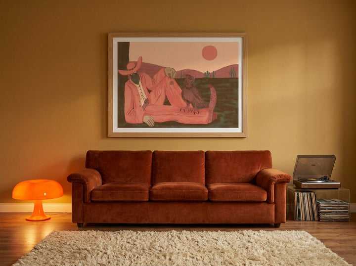 Modern wall art print styled on the wall in a retro 70s living room