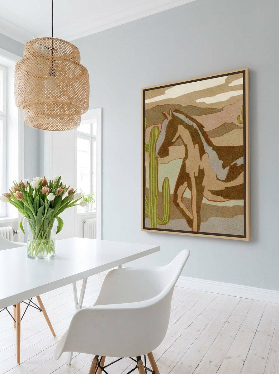 Oversized statement canvas wall art with a natural timber surround styled on the wall in a bright Scandinavian home office