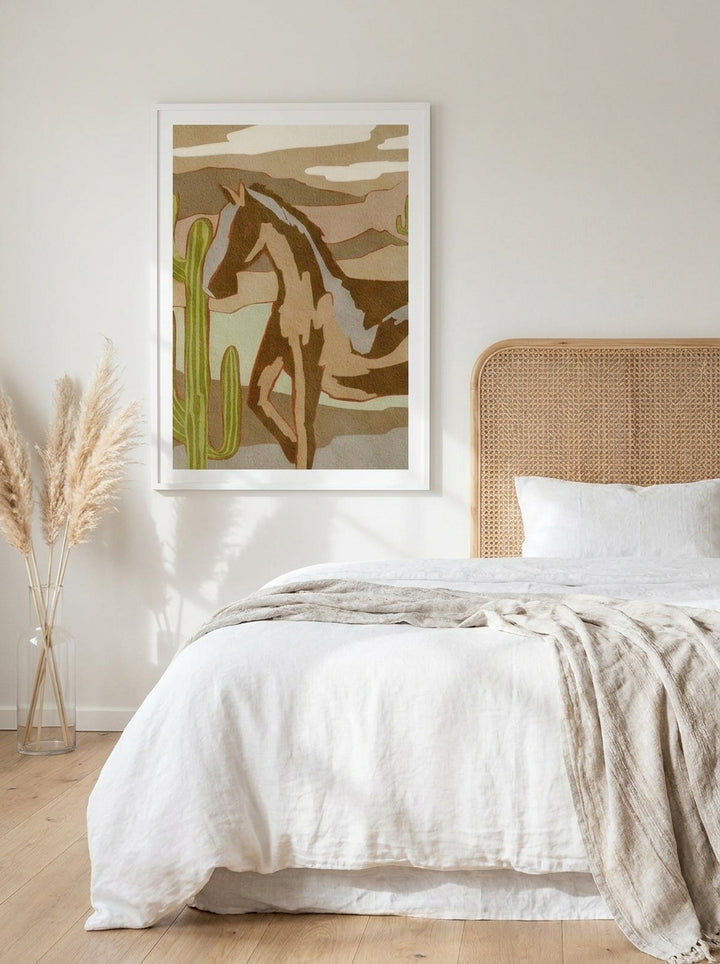Modern wall art print styled on the wall in a coastal bedroom