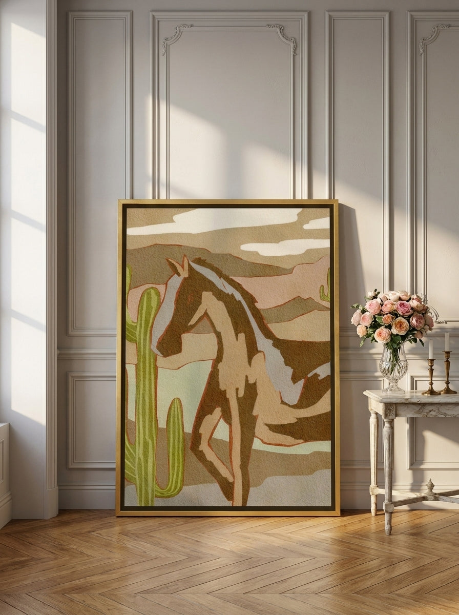 Canvas wall art with a gold leaf surround leaning against the wall in a Parisian home office