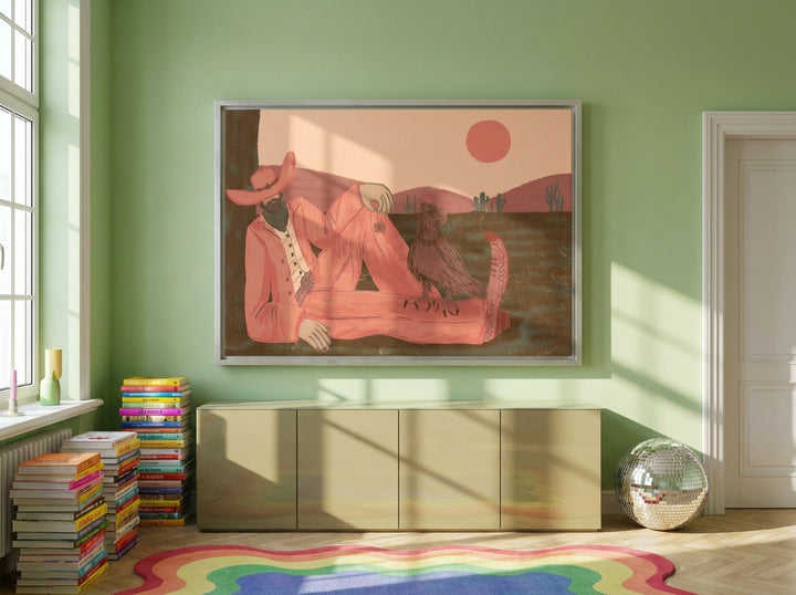 Oversized statement canvas wall art with a silver leaf surround styled on the wall in a colourful eclectic living room