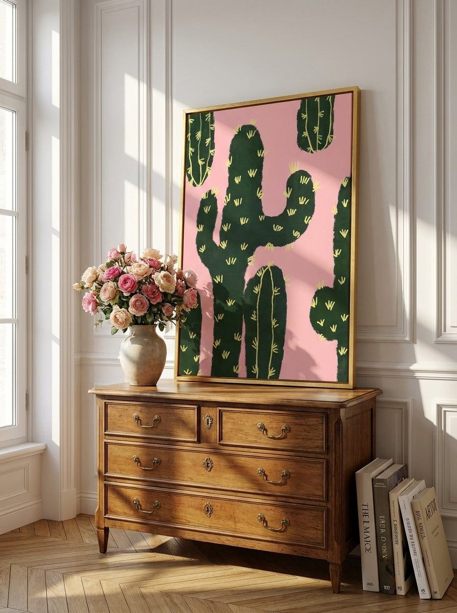 Canvas wall art with a gold leaf surround standing on a sideboard in a Parisian bathroom