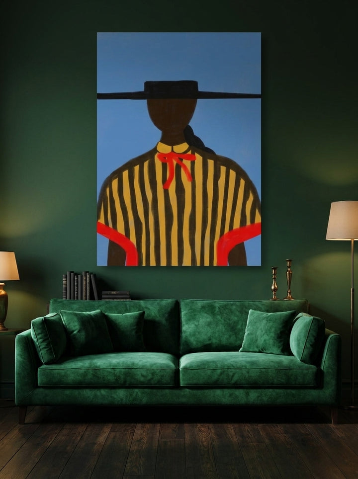 Stretched canvas wall art styled on the wall in a moody living room