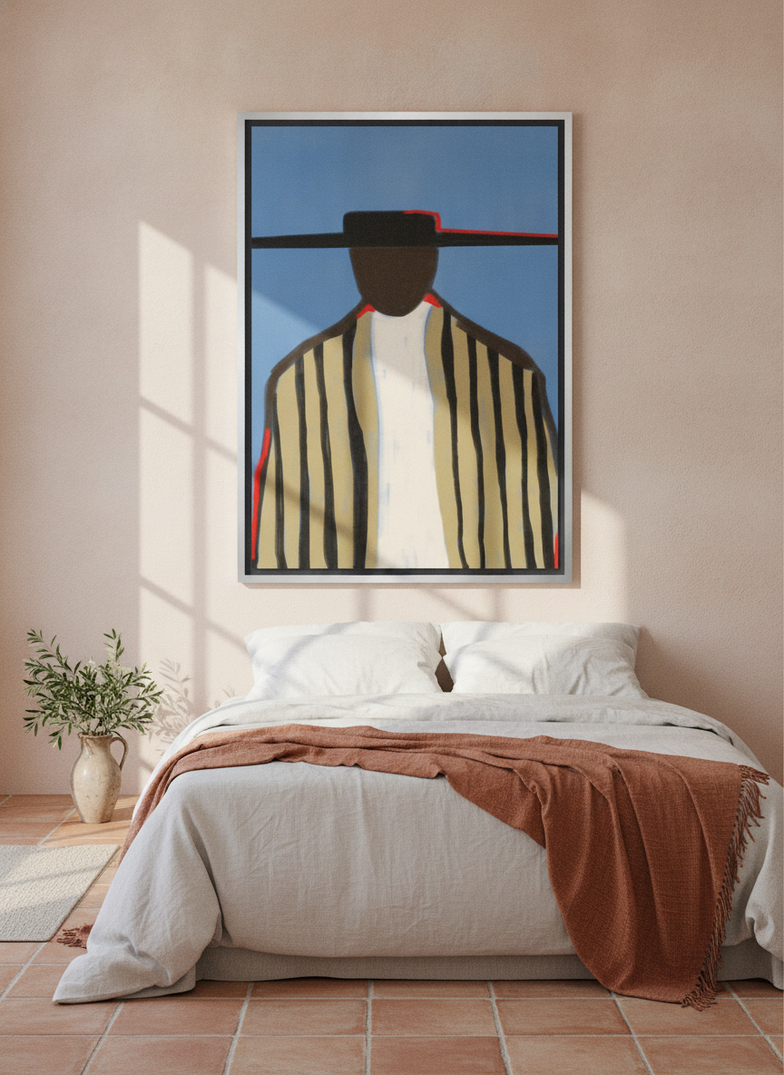 Canvas wall art with a silver leaf surround styled on the wall in a Mediterranean bedroom