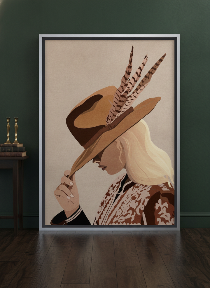 Oversized statement canvas wall art with a silver leaf surround leaning against the wall in a moody living room