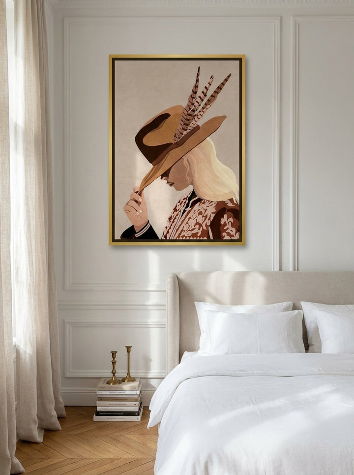 Canvas wall art with a gold leaf surround styled on the wall in a Parisian bedroom