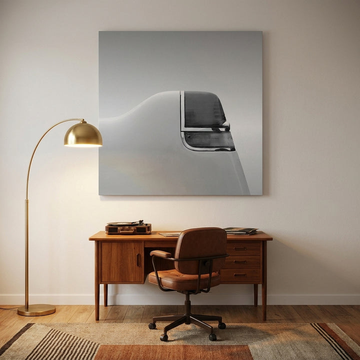 Stretched canvas wall art styled on the wall in a mid-century home office