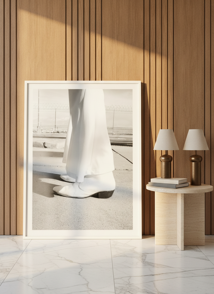 Modern wall art print leaning against the wall in a luxe home office