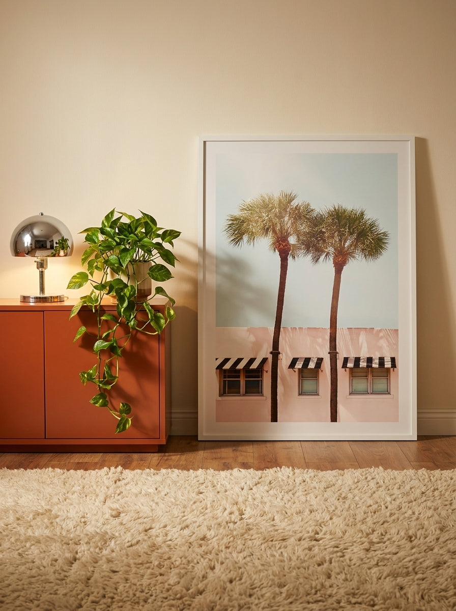 Modern wall art print standing on a sideboard in a retro 70s living room