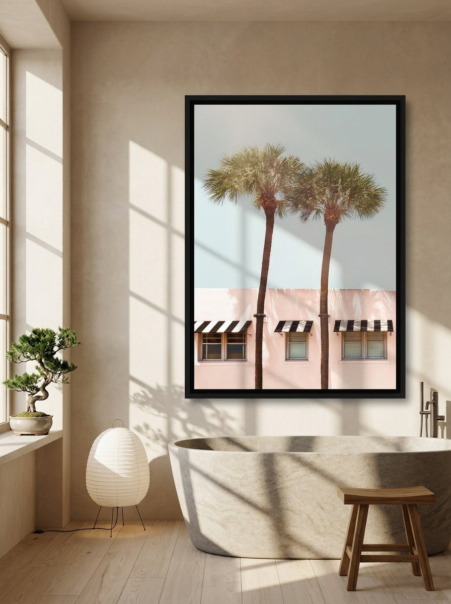 Canvas wall art with a black surround styled on the wall in a warm Japandi bathroom