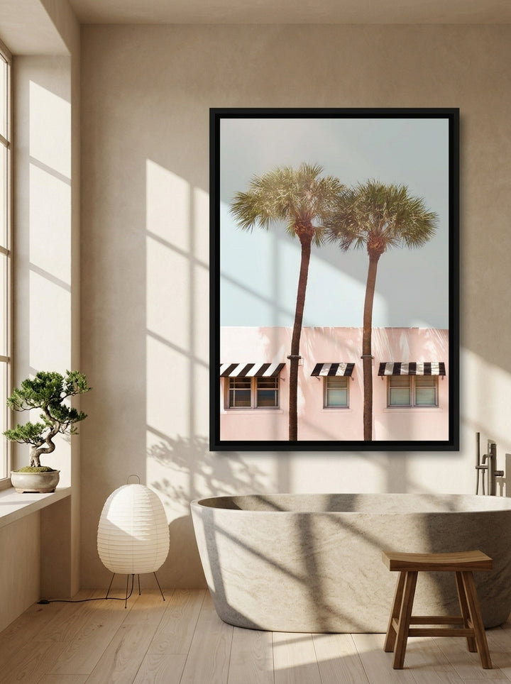 Canvas wall art with a black surround styled on the wall in a warm Japandi bathroom
