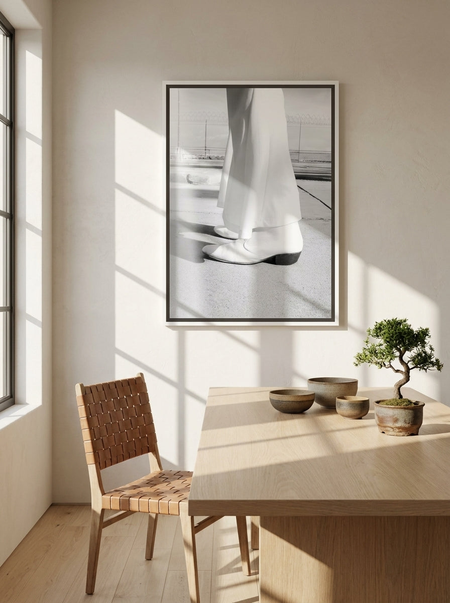 Canvas wall art with a white surround styled on the wall in a warm Japandi home office