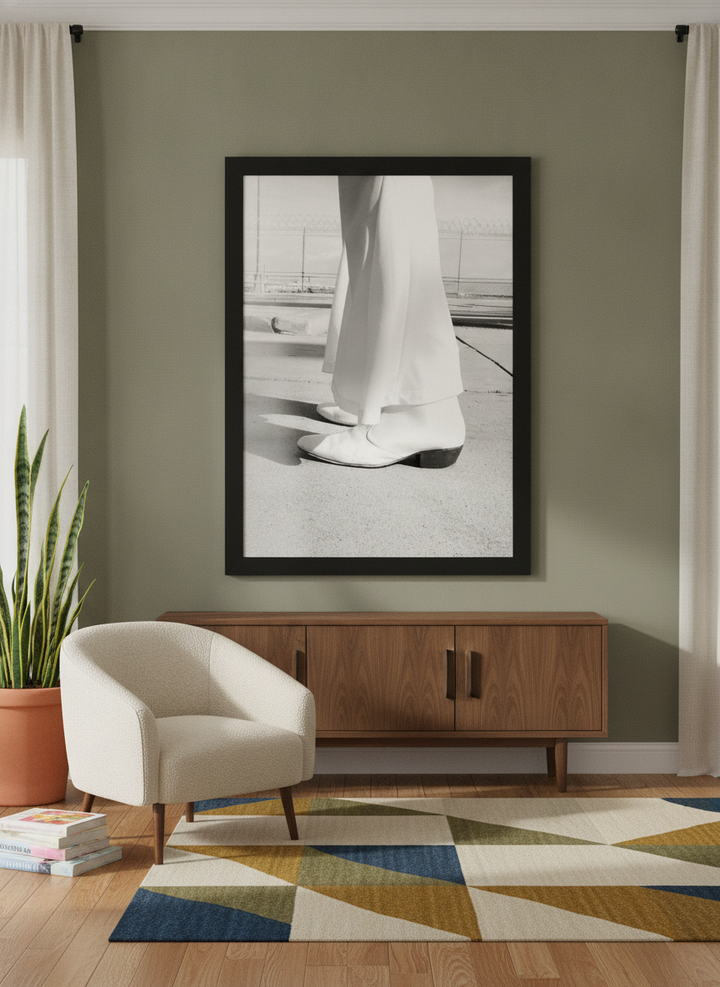 Oversized statement modern wall art print styled on the wall in a mid-century living room