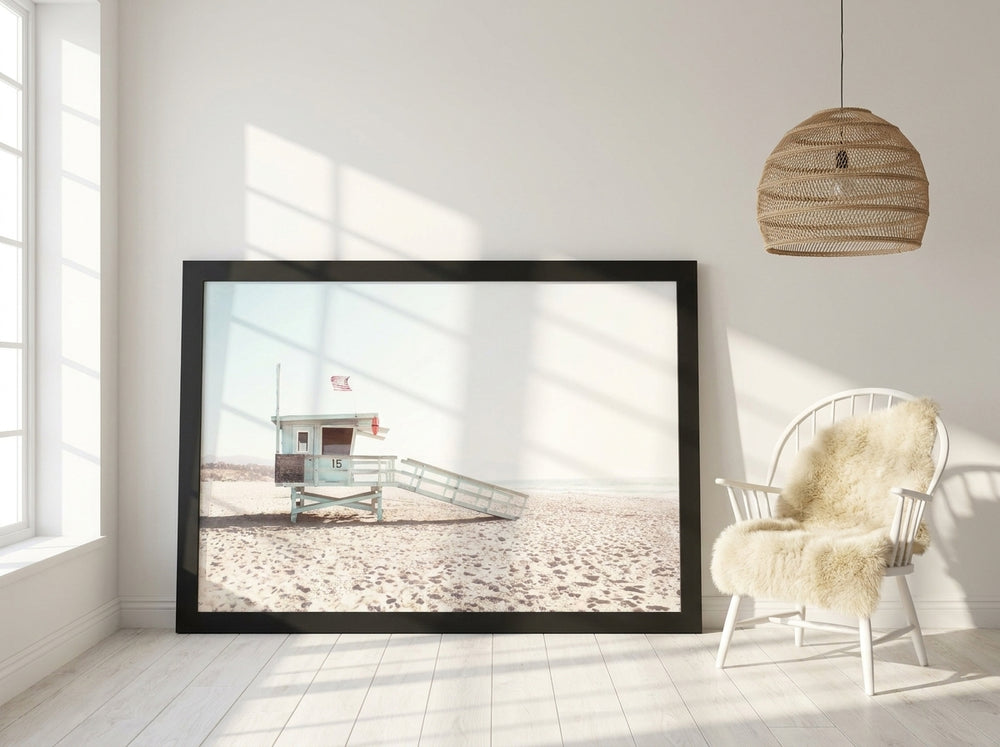 Oversized statement modern wall art print leaning against the wall in a bright Scandinavian living room