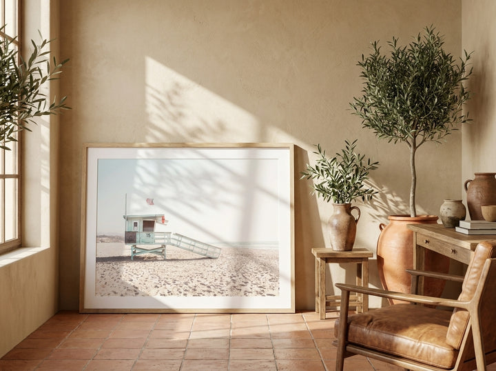 Modern wall art print leaning against the wall in a Mediterranean home office