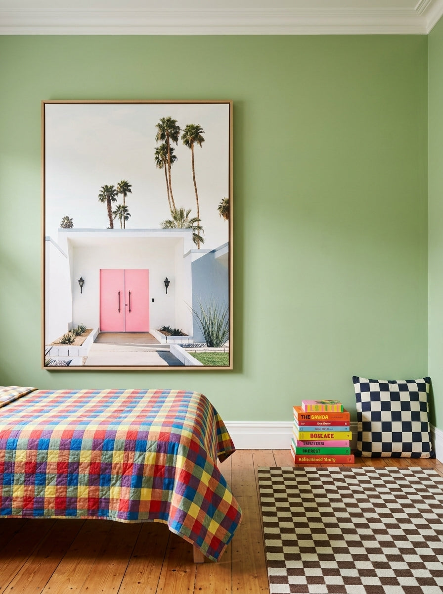 Oversized statement canvas wall art with a natural timber surround styled on the wall in a colourful eclectic bedroom