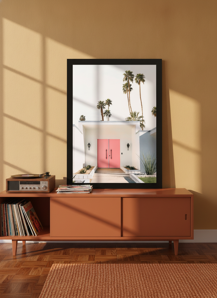 Modern wall art print standing on a sideboard in a retro 70s living room