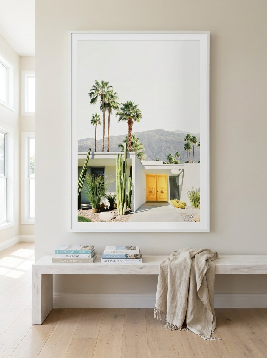 Oversized statement modern wall art print styled on the wall in a coastal living room