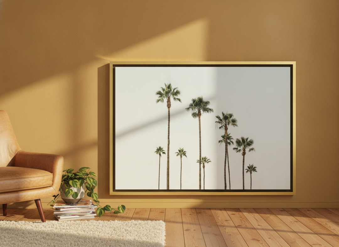 Canvas wall art with a gold leaf surround leaning against the wall in a retro 70s living room