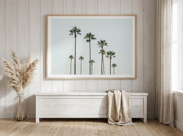 Modern wall art print styled on the wall in a coastal living room