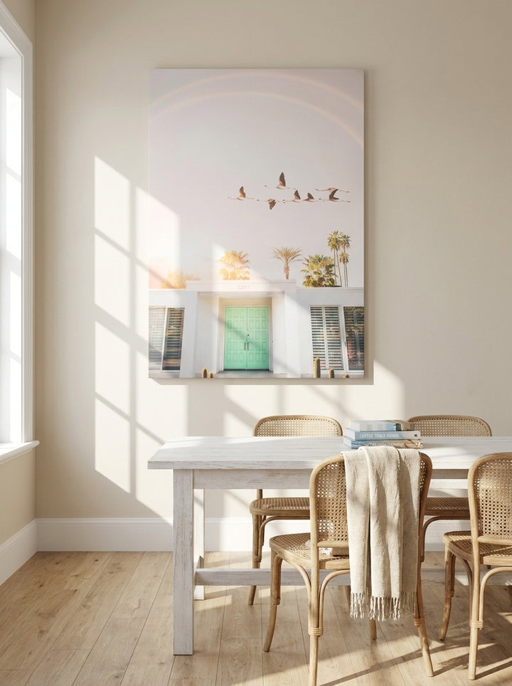 Stretched canvas wall art styled on the wall in a coastal dining room