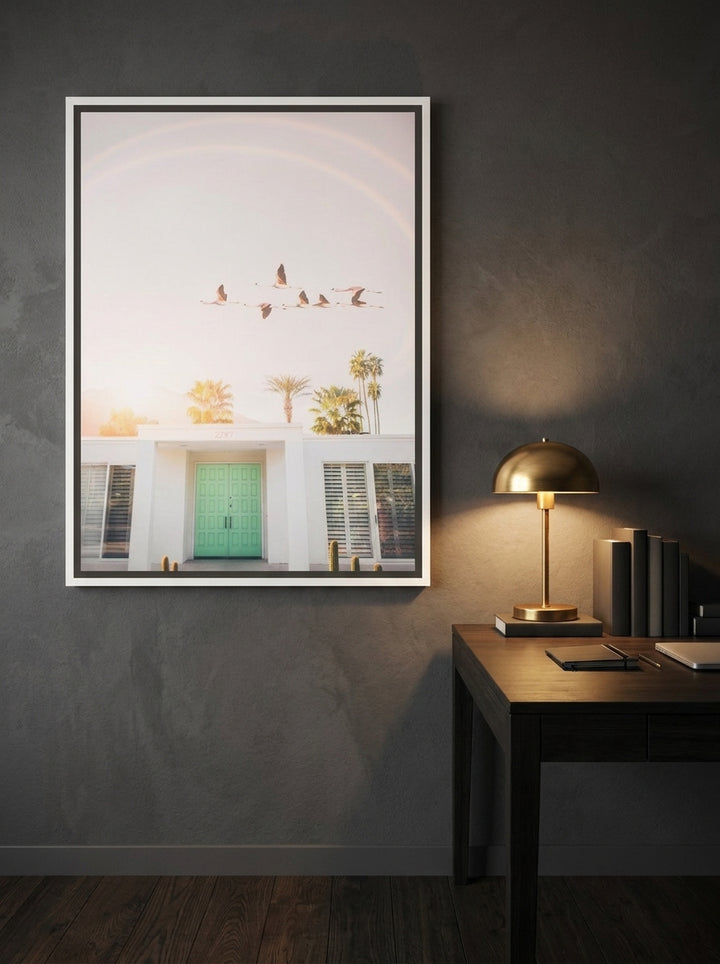 Canvas wall art with a white surround styled on the wall in a moody home office