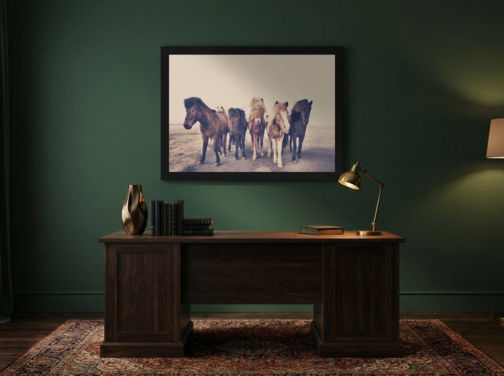 Modern wall art print styled on the wall in a moody home office