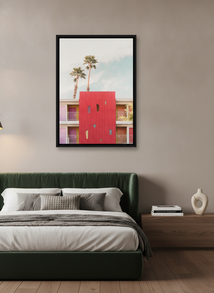 Oversized statement canvas wall art with a black surround styled on the wall in a luxe bedroom