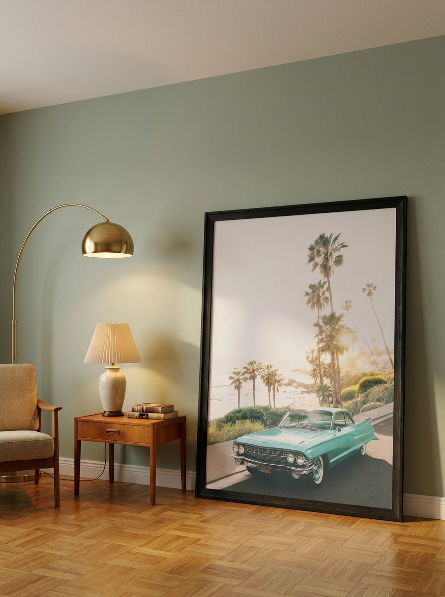 Oversized statement modern wall art print leaning against the wall in a mid-century living room