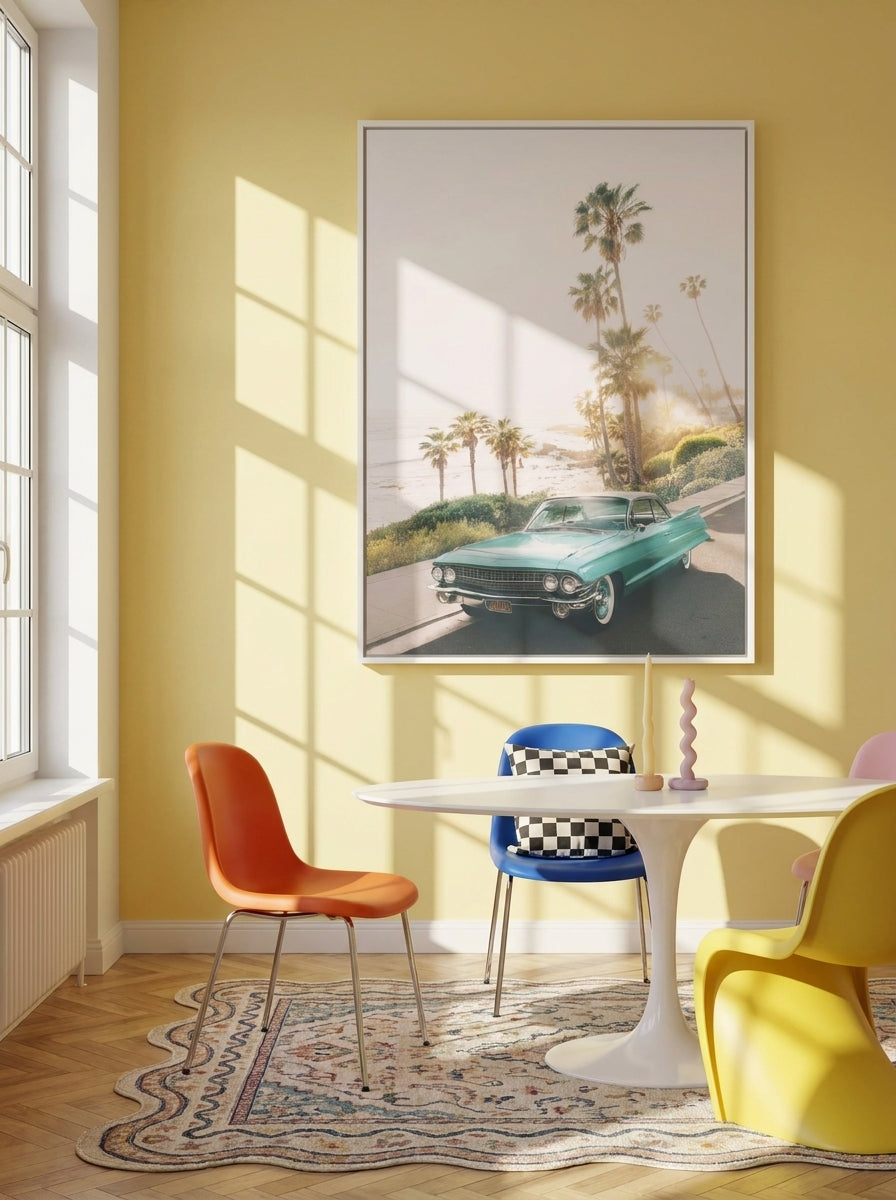 Oversized statement canvas wall art with a white surround styled on the wall in a colourful eclectic dining room