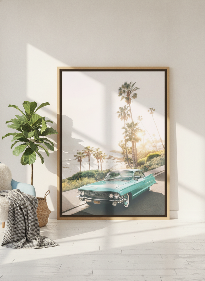 Oversized statement canvas wall art with a natural timber surround leaning against the wall in a bright Scandinavian living room