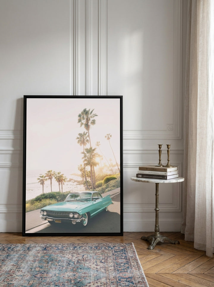 Canvas wall art with a black surround leaning against the wall in a Parisian home office