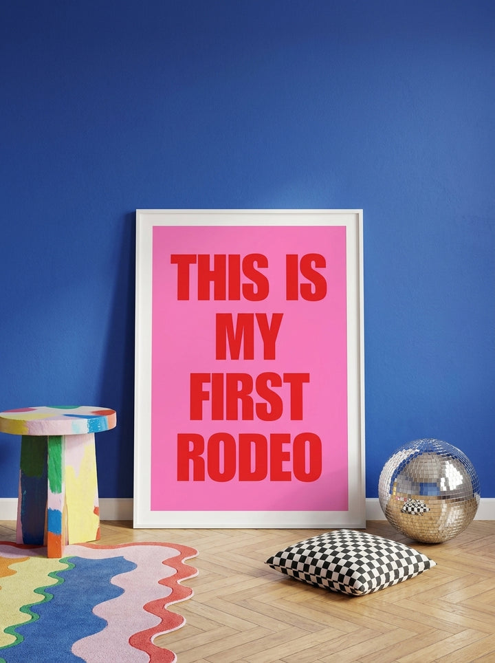 Oversized statement modern wall art print leaning against the wall in a colourful eclectic dining room