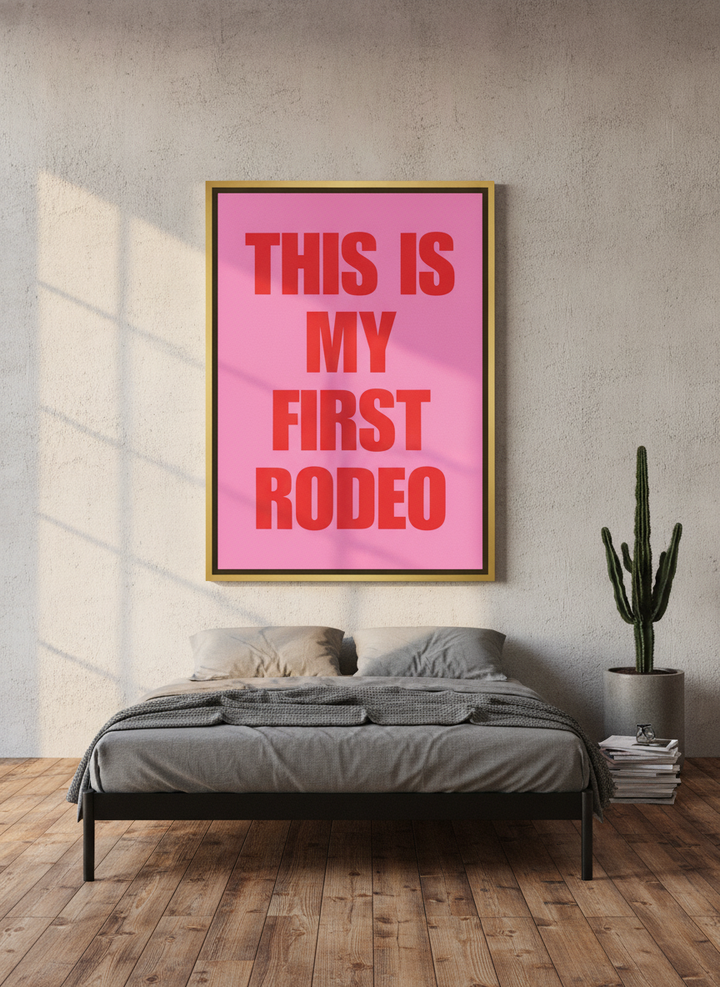 Oversized statement canvas wall art with a gold leaf surround styled on the wall in an industrial loft bedroom