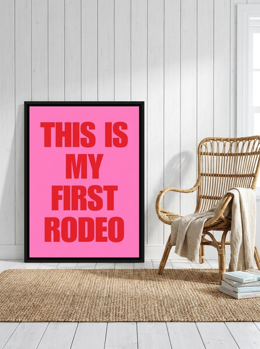 Canvas wall art with a black surround leaning against the wall in a coastal living room