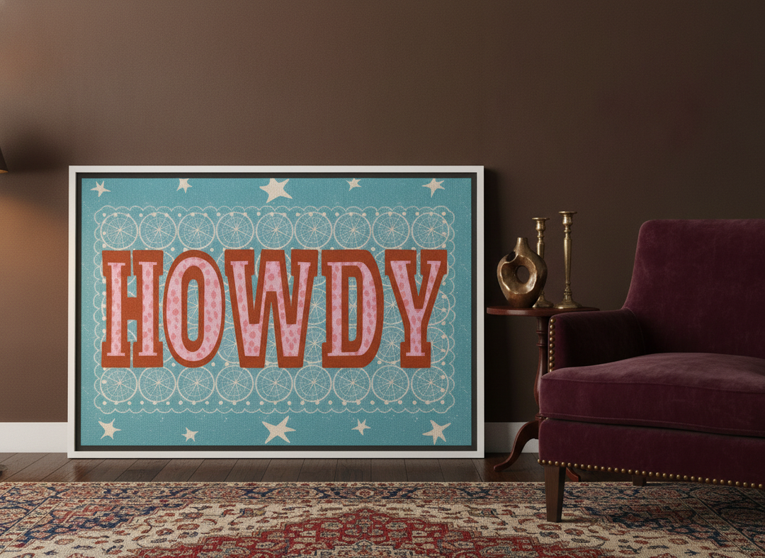 Canvas wall art with a white surround leaning against the wall in a moody living room