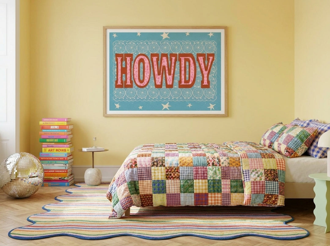 Modern wall art print styled on the wall in a colourful eclectic bedroom
