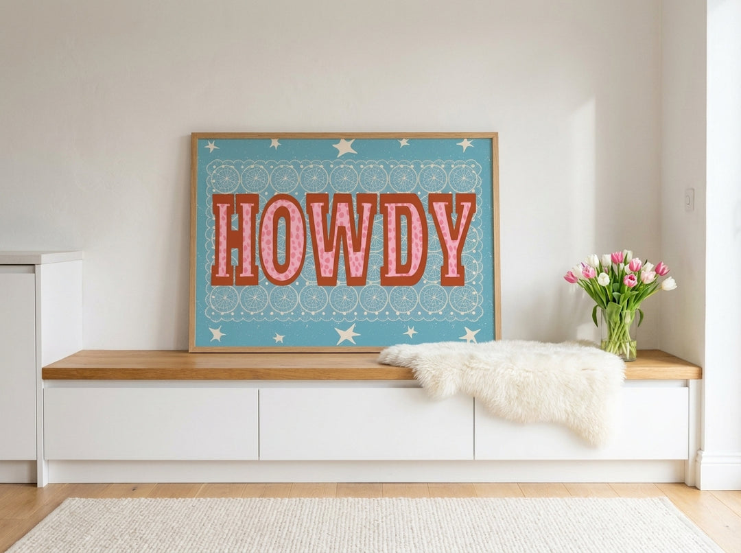Modern wall art print standing on a kitchen bench in a bright Scandinavian kitchen