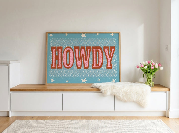 Modern wall art print standing on a kitchen bench in a bright Scandinavian kitchen