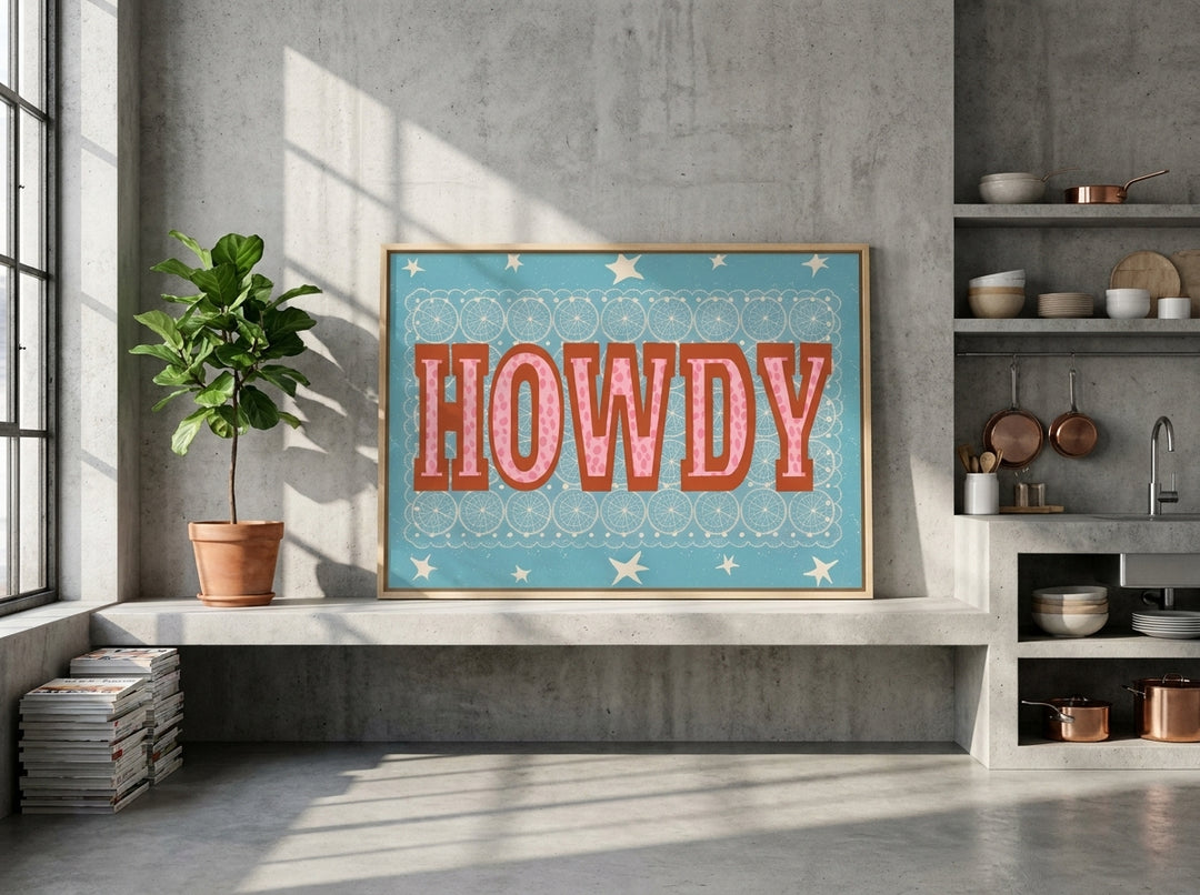 Canvas wall art with a natural timber surround standing on a kitchen bench in an industrial loft kitchen