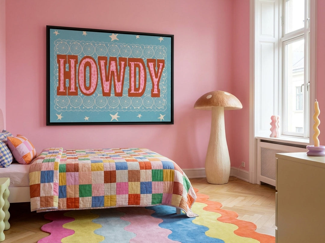 Oversized statement canvas wall art with a black surround styled on the wall in a colourful eclectic bedroom