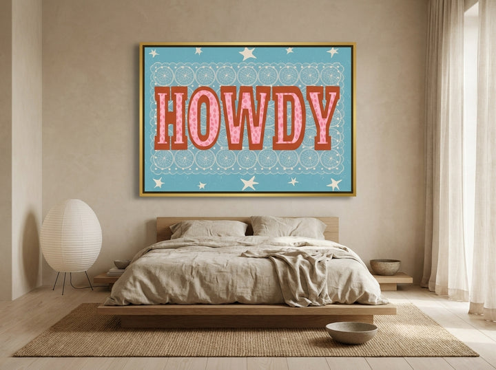 Oversized statement canvas wall art with a gold leaf surround styled on the wall in a warm Japandi bedroom