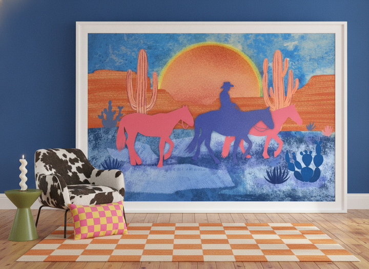 Oversized statement modern wall art print leaning against the wall in a colourful eclectic living room