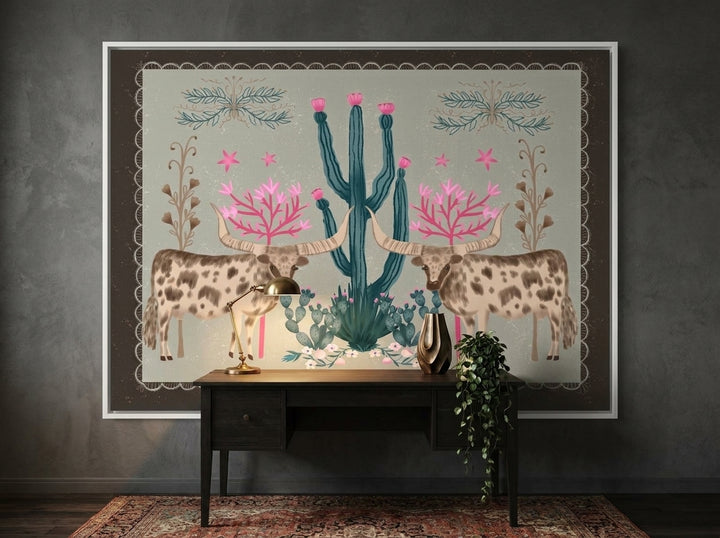 Oversized statement canvas wall art with a white surround styled on the wall in a moody home office