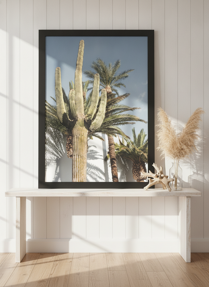 Modern wall art print standing on a console in a coastal home office