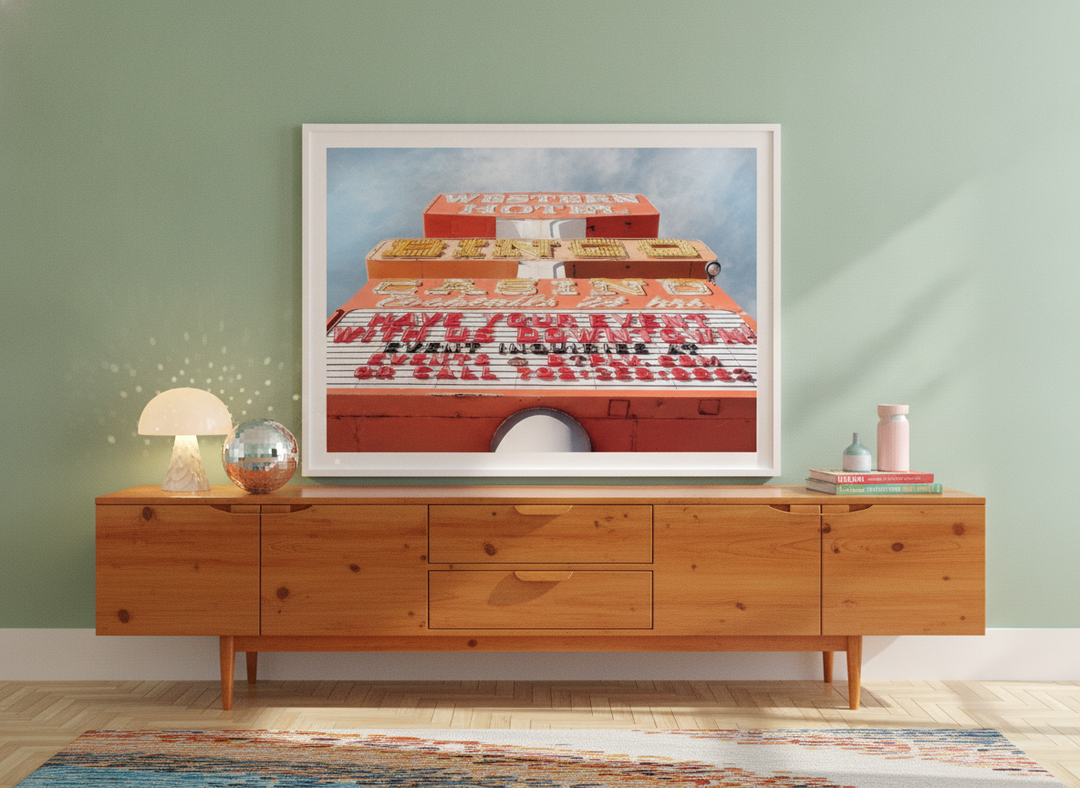 Modern wall art print standing on a sideboard in a colourful eclectic living room