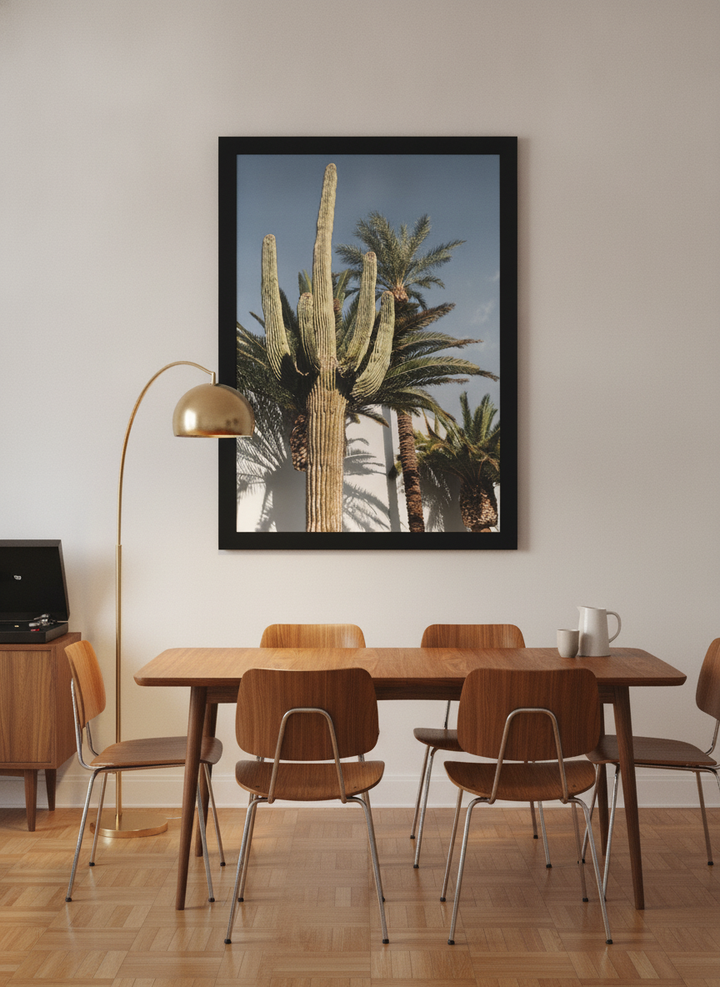 Modern wall art print styled on the wall in a mid-century dining room