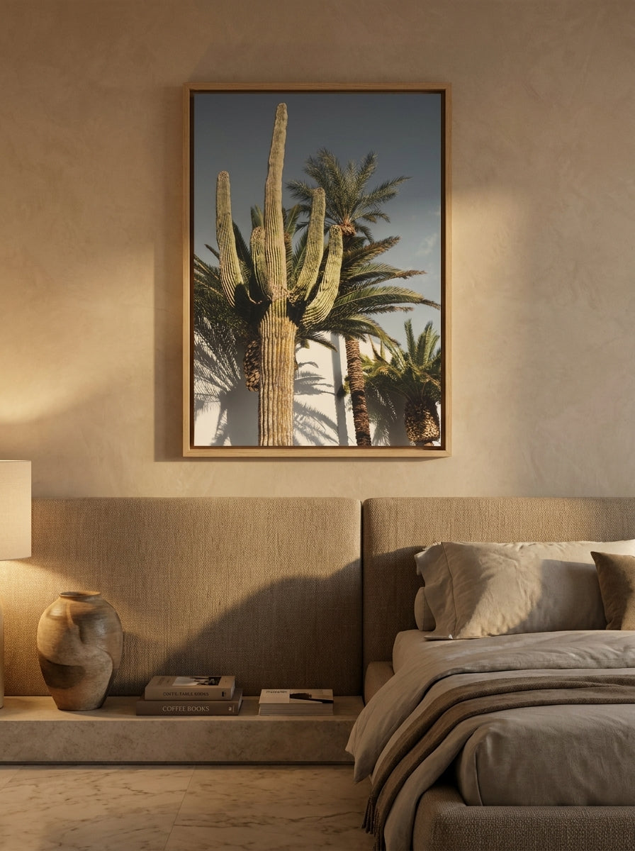 Canvas wall art with a natural timber surround styled on the wall in a luxe bedroom